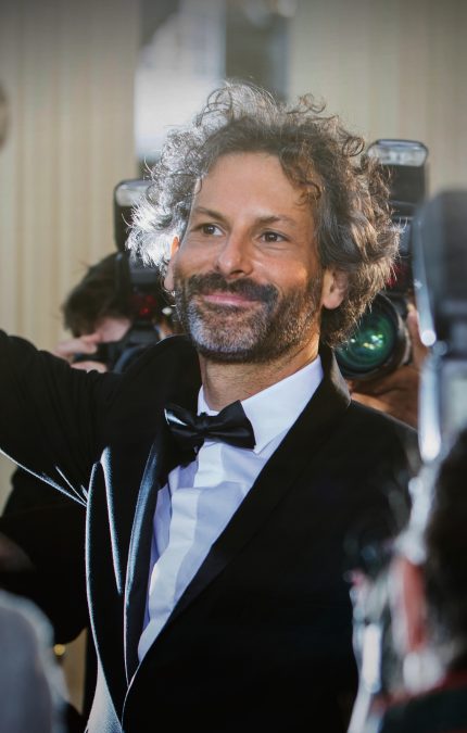 Celebrity waving during the Cannes Film Festival