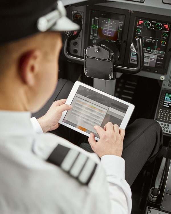 Private jet pilot booking a chauffeured airport transfer