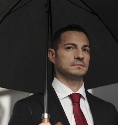 Gianfranco with an umbrella