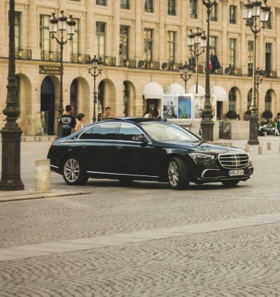 A chauffeur service vehicle on the streets of Paris