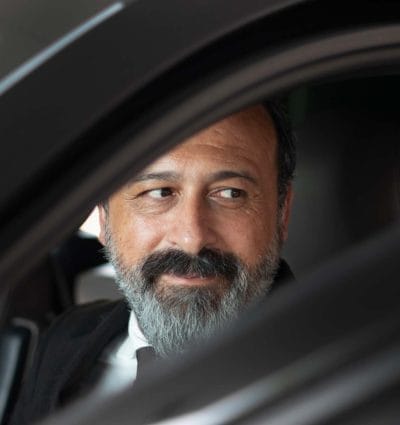Private chauffeur Massimiliano from Catania inside his vehicle