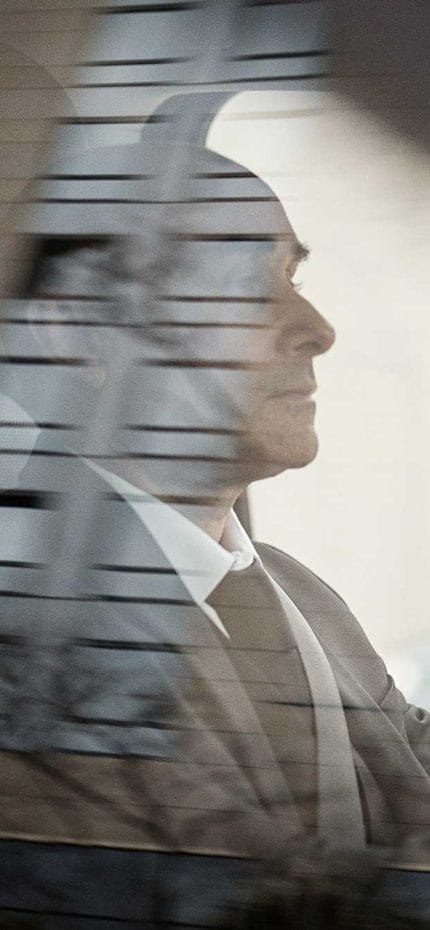 Private chauffeur Roger from Paris waiting inside his vehicle.