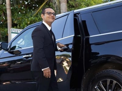 Private chauffeur Jose Ezequiel from Cancun outside his vehicle