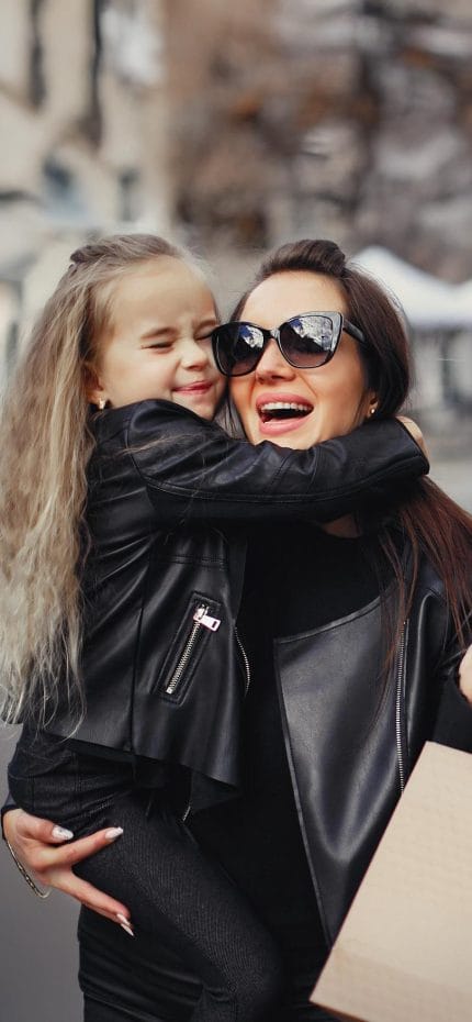 Mother and daughter enjoying a shopping day in Lima