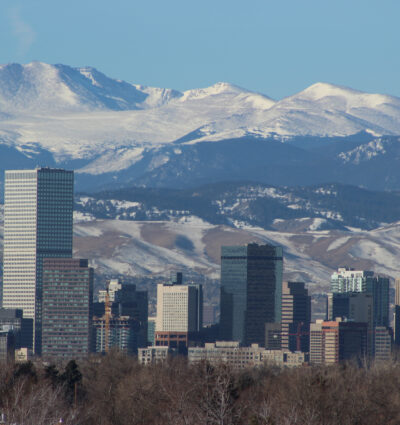 Downtown Denver, Colorado, with views of the snow-capped Rocky Mountains in winter.